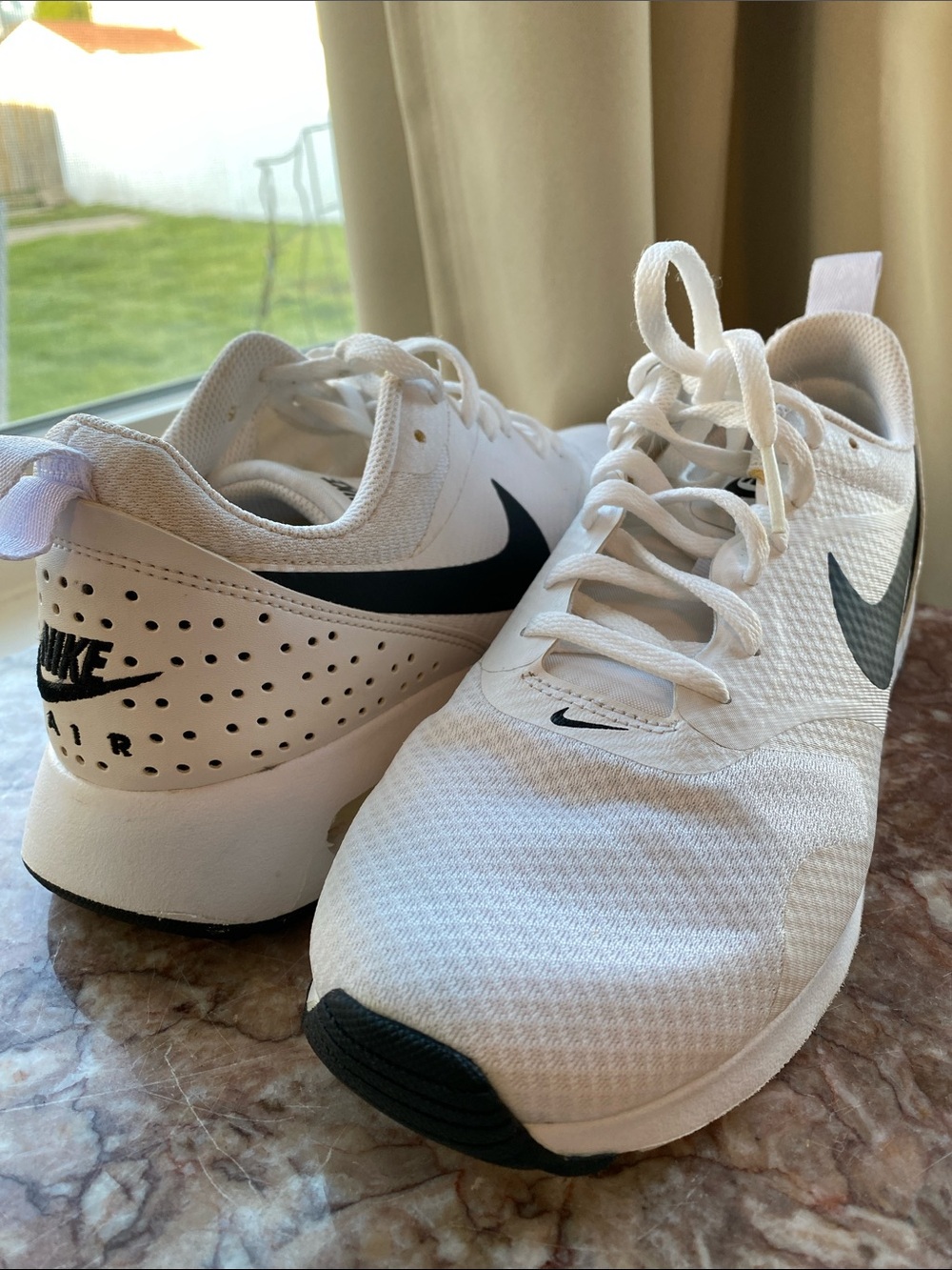 Nike White Running Sneakers with Black Swoosh Accents